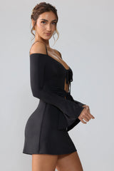 Slinky Jersey Long Sleeve Cut Out Mini Dress in Black